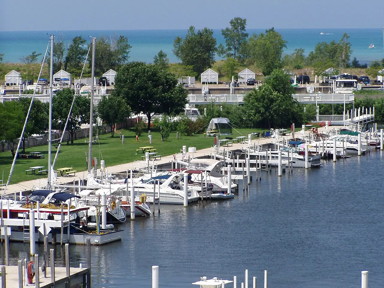 Boats docked in the New Buffalo marina with Lake Michigan beyond